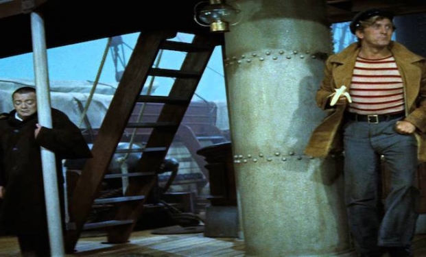 Kirk Douglas in una scena di "Ventimila leghe sotto i mari" Kirk Douglas in una scena di "Ventimila leghe sotto i mari"